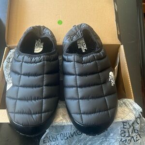 Brand New in the original box and tissue  The North Face Black Slippers Size 12